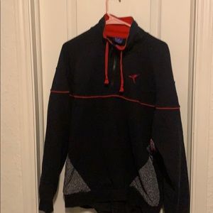 Red and black and grey quarter zip Jordan jacket